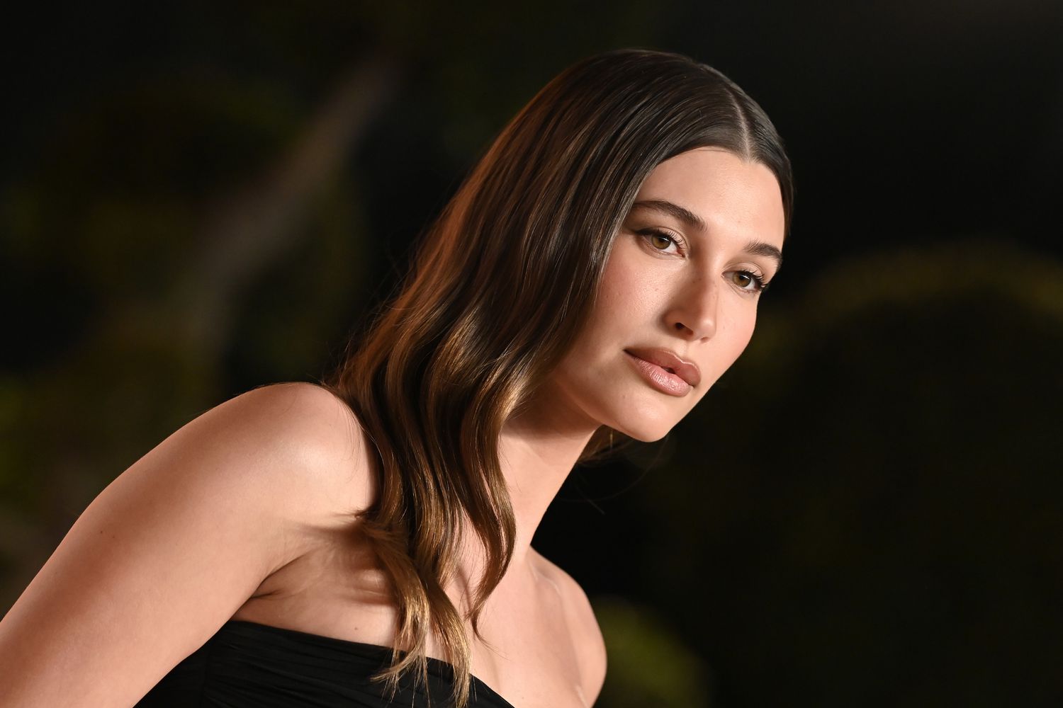 Hailey Bieber Stuns in the Tiniest Backless Little Black Dress at Coachella 2025